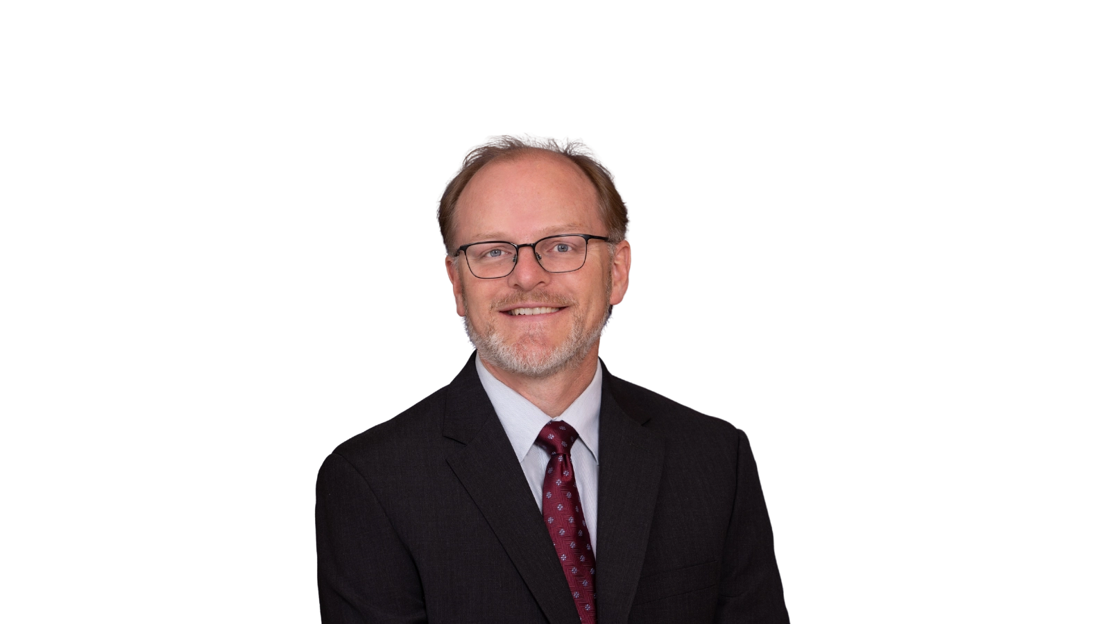 man in suit with red tie